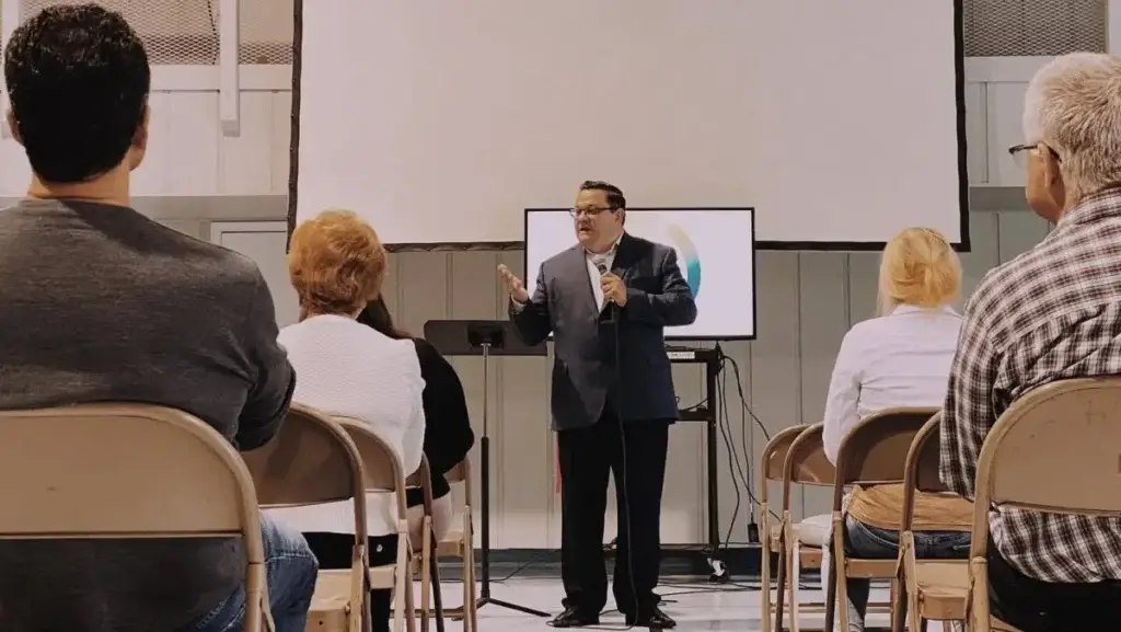 Pastor speaking to congregation